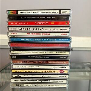 16 CDs Traffic Joe Cocker The Beatles The Rascals Harry Connick Paul Simon etc